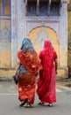 Women with colorful sarees on street in Jaipur, India